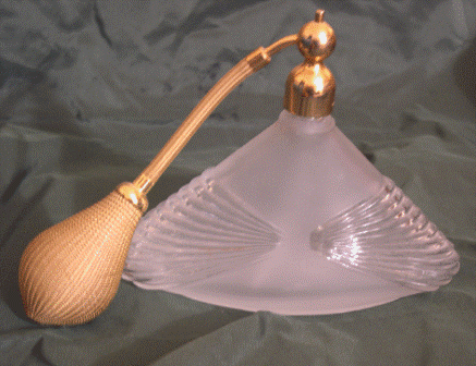 Vaporisateur en forme triangulaire